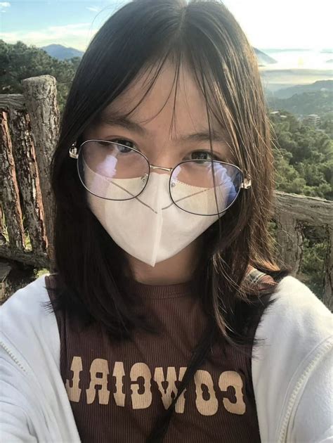 Cute pinay with glasses .